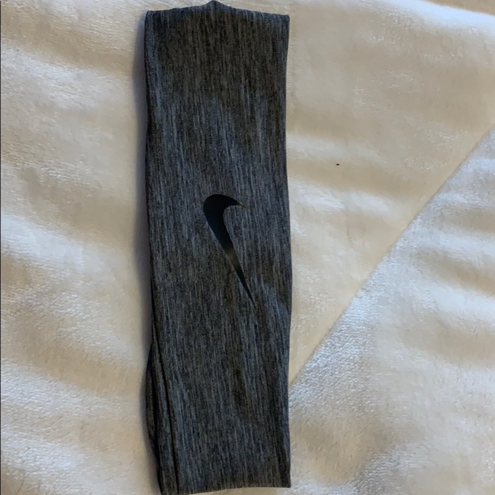 Grey Nike headband with black swoosh